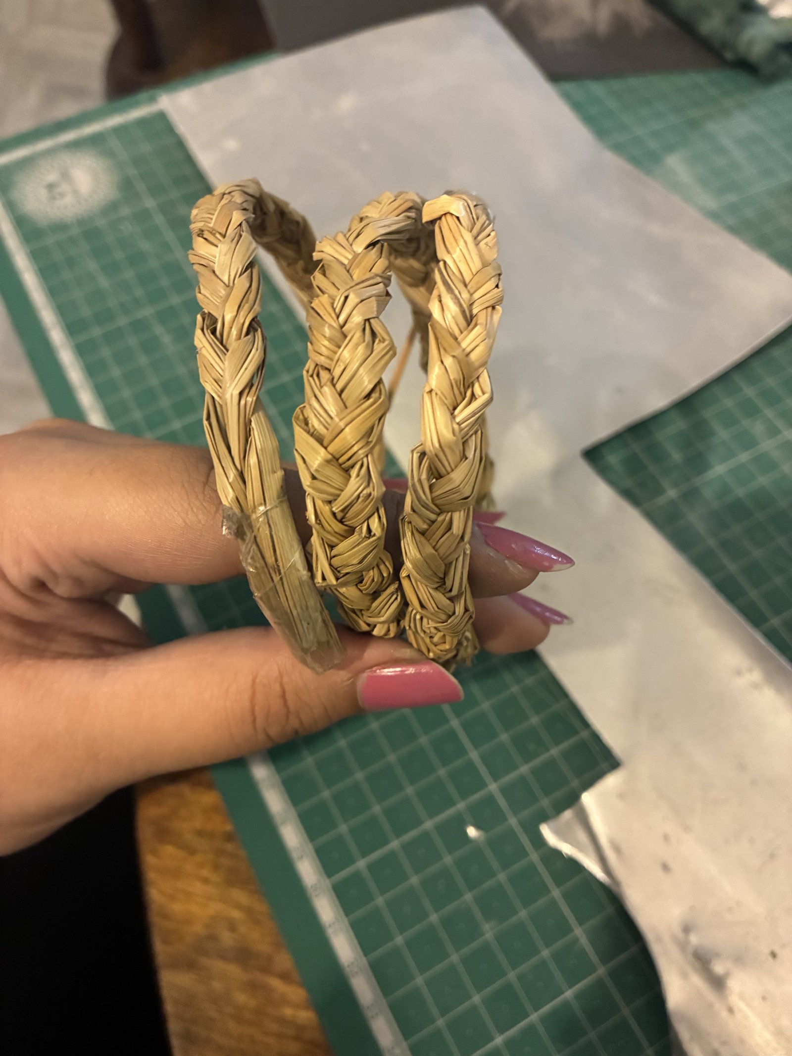 Braided water hyacinth coils drying in workshop